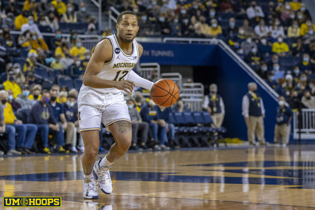 Devante Jones takes the ball down the floor for the Michigan Wolverines against Southern Utah.