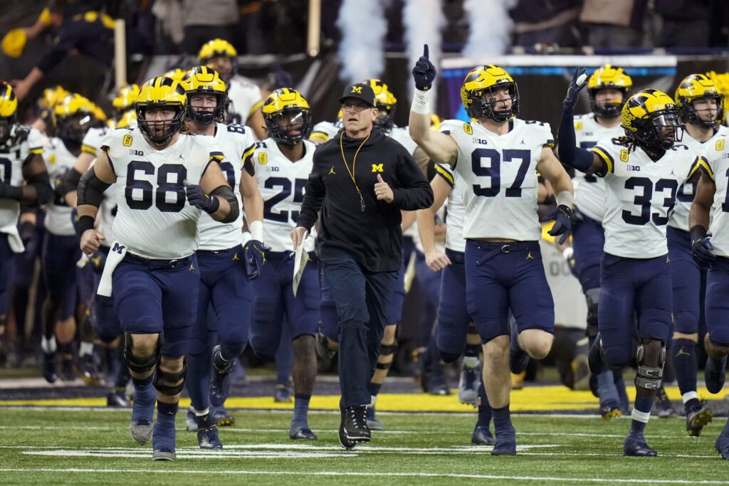 Wolverines run out on to the field for the Big 10 Championship game