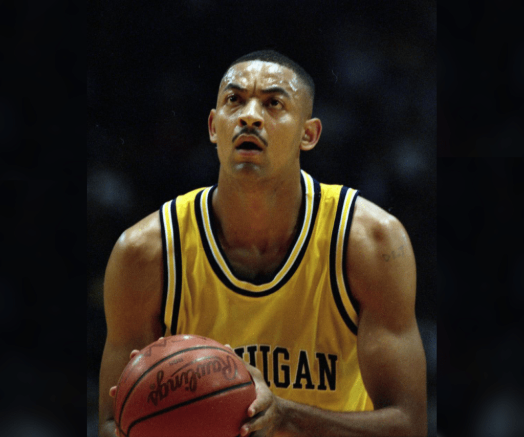 Juwan Howard lines up for the free throw.