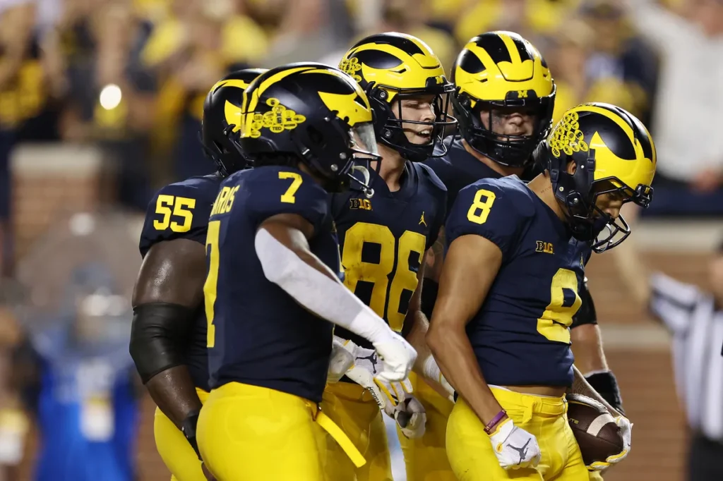 Michigan Wolverines celebrate a Ronnie Bell touchdown. Photo- Gregory Shamus, Getty Images