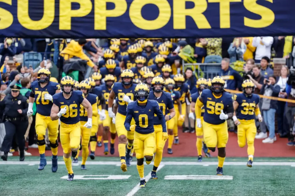 Michigan Wolverines exit the tunnel to take on the Maryland Terrapins
